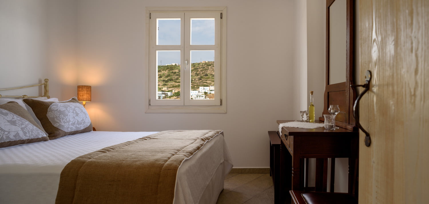 master bedroom at Casa Kimon a holiday home in Kimolos Cyclades Greece by RentAGreekHome powere by PathTravelDesigns