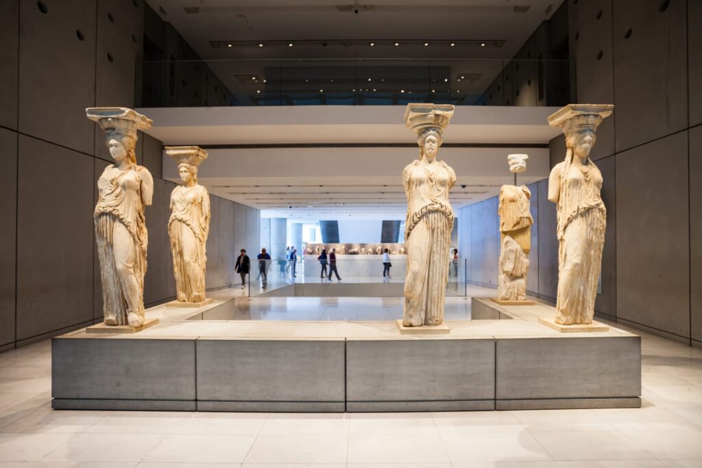 The caryatids statues found within the Acropolis museum in Athens, a place worth visiting in the winter The original marble Caryatids found in the Athens Acropolis museum and is worth visiting in the winter.